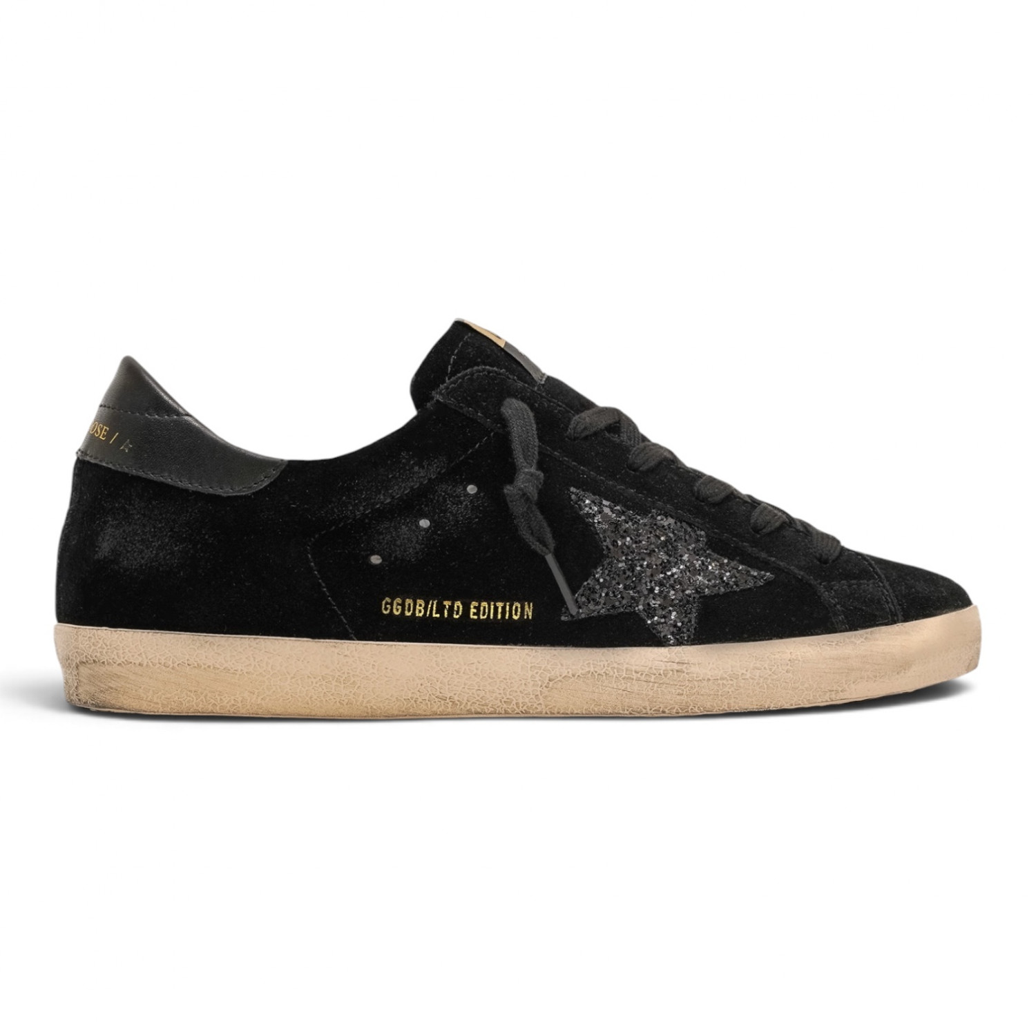 Super Star LTD in black suede with black glitter star and black leather heel tab