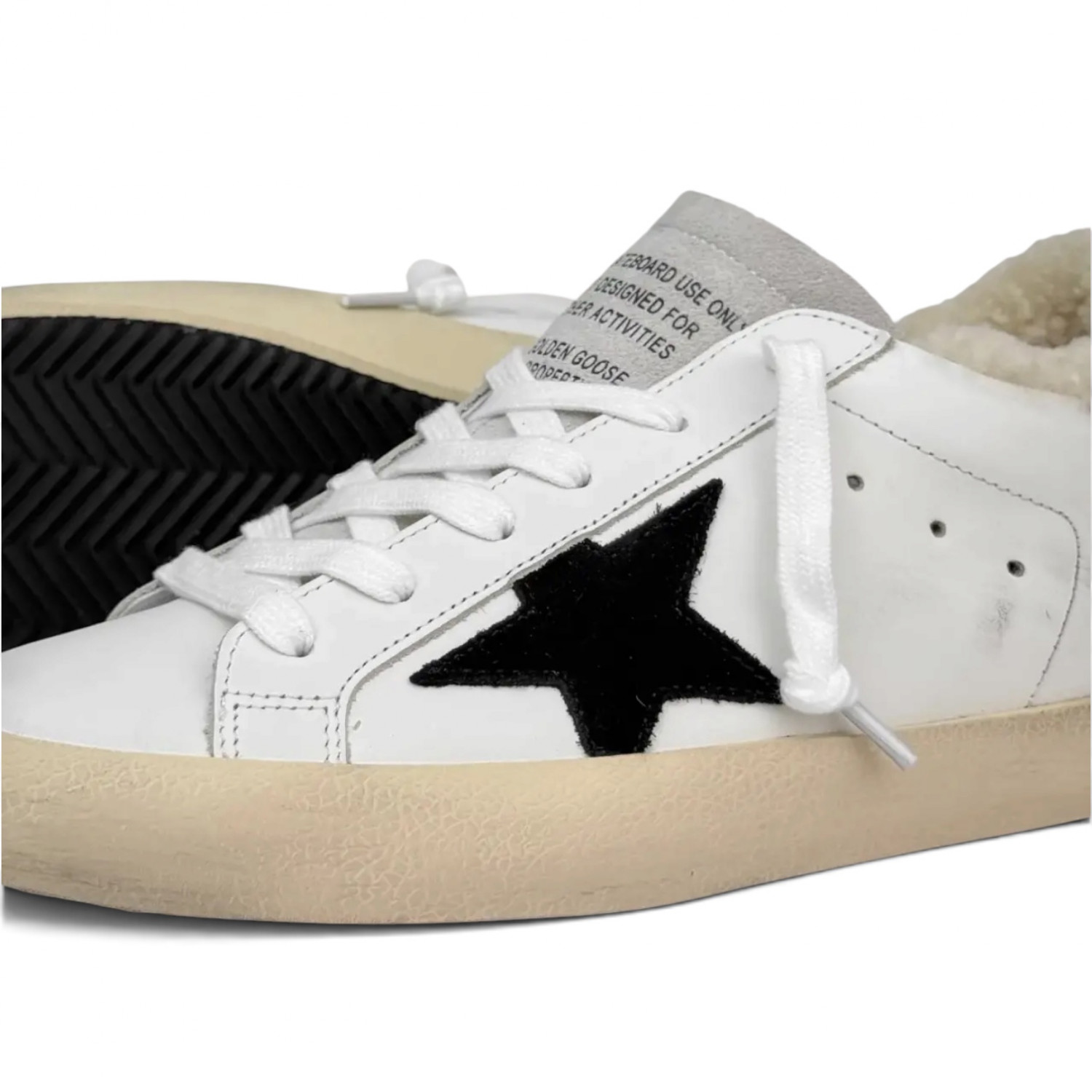 SUPER STAR IN WHITE LEATHER AND SHEARLING WITH BLACK STAR AND SILVER HEEL TAB