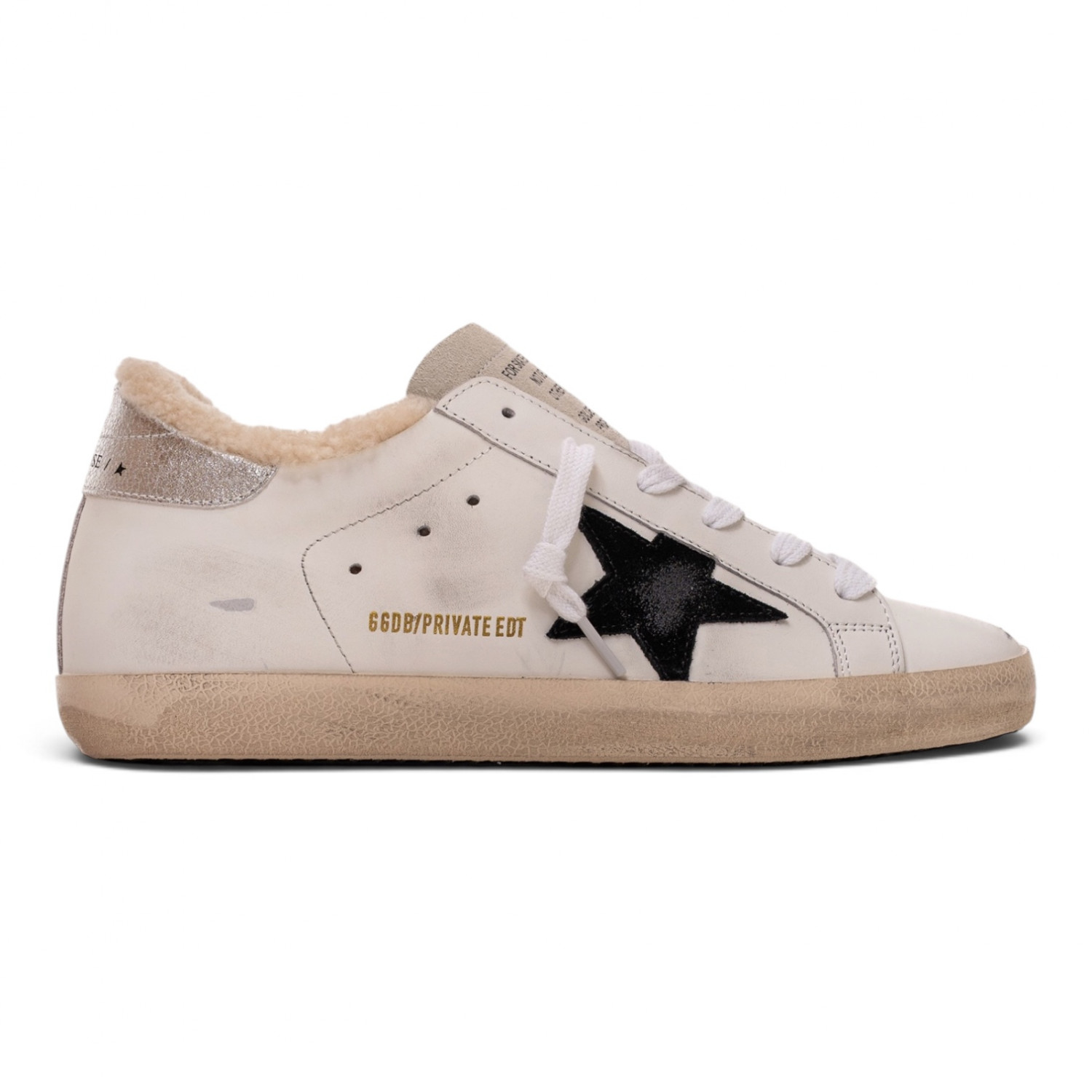 Super Star in white leather and shearling with black star and silver heel tab