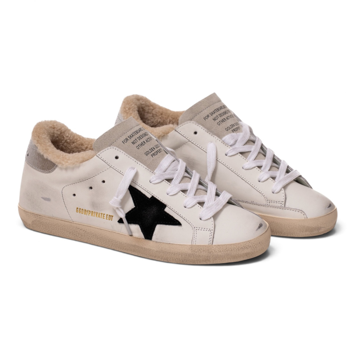 SUPER STAR IN WHITE LEATHER AND SHEARLING WITH BLACK STAR AND SILVER HEEL TAB
